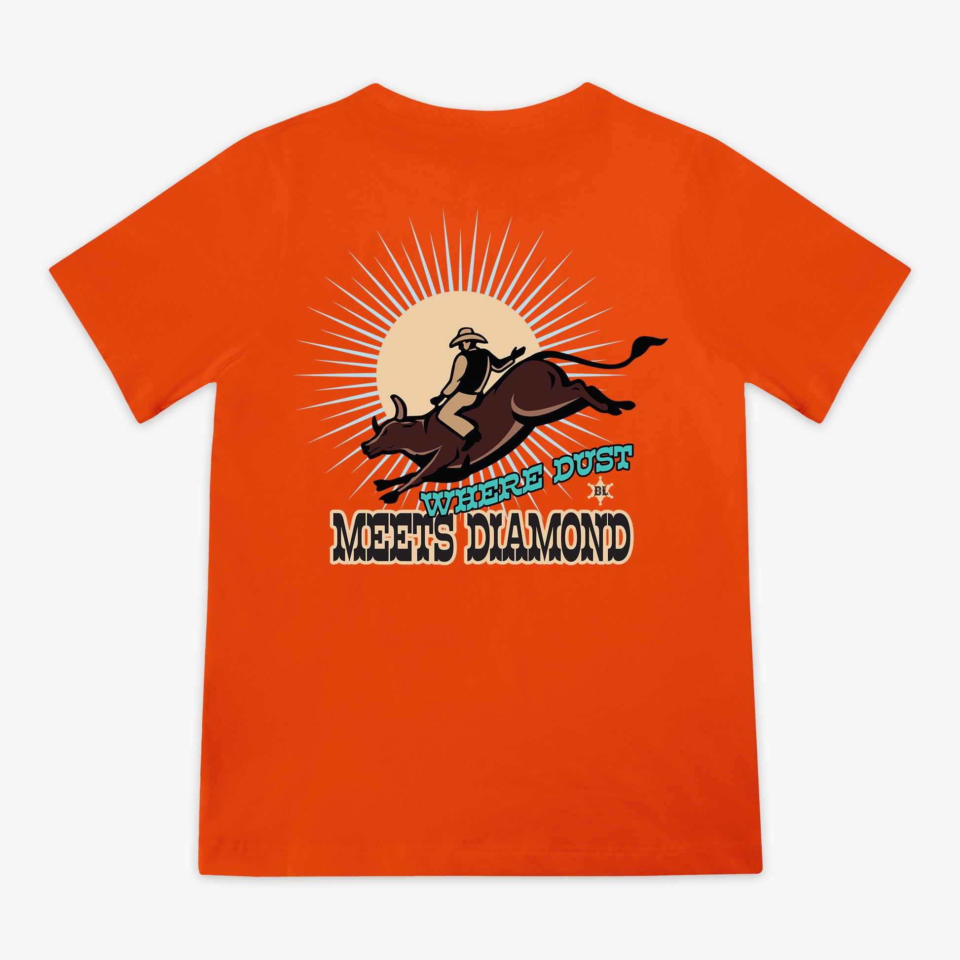 Orange t-shirt with a graphic of a person riding a bucking bronco and 'Where Dust Meets Diamond' text on a white background