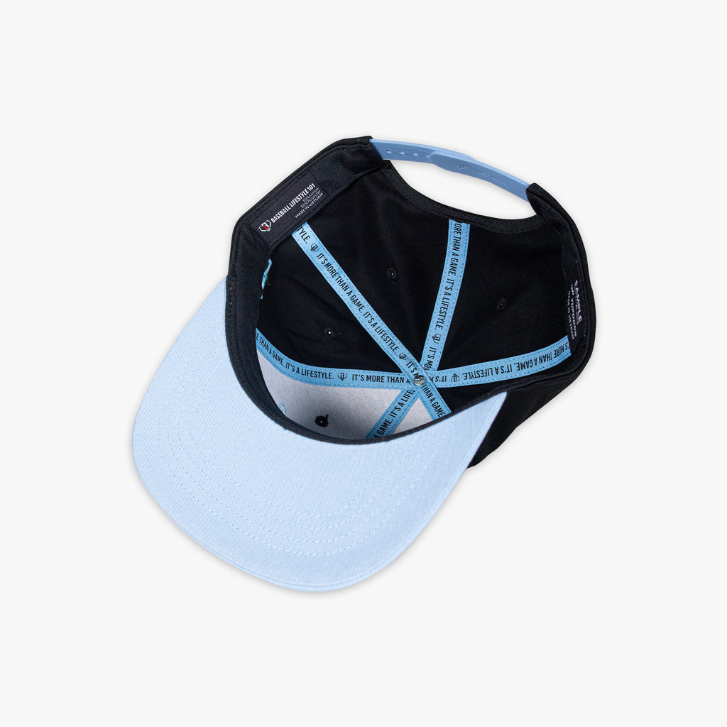 Black and light blue cap with 'Baseball Lifestyle 101' on a white background
