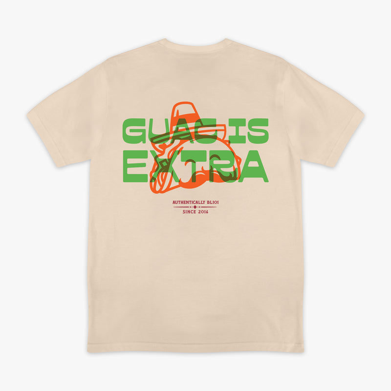 Beige t-shirt with 'Guac is Extra' graphic design on a white background