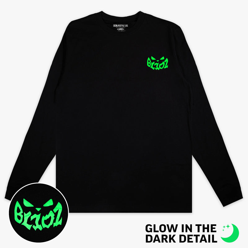 Black long sleeve tee with glow-in-the-dark "Jack O' Lantern Team" detail