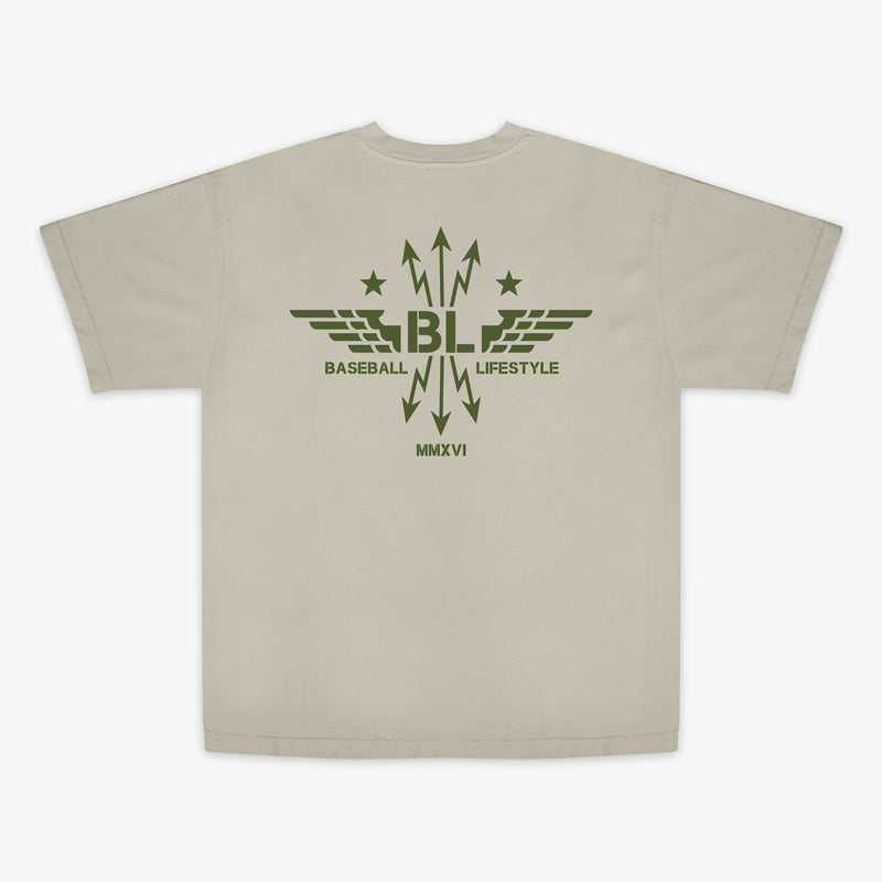 Tan t-shirt with dark green graphic featuring wings, arrows, and stars, with the Baseball Lifestyle BL logo in the center