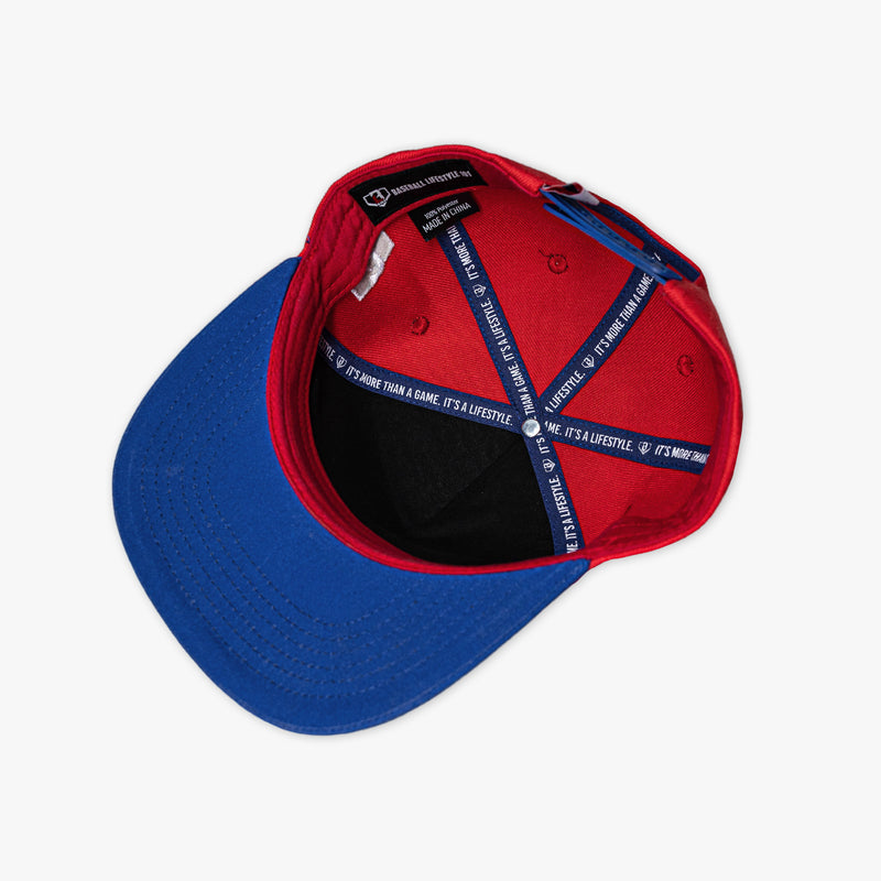 Interior of red and blue cap with text inside on a white background