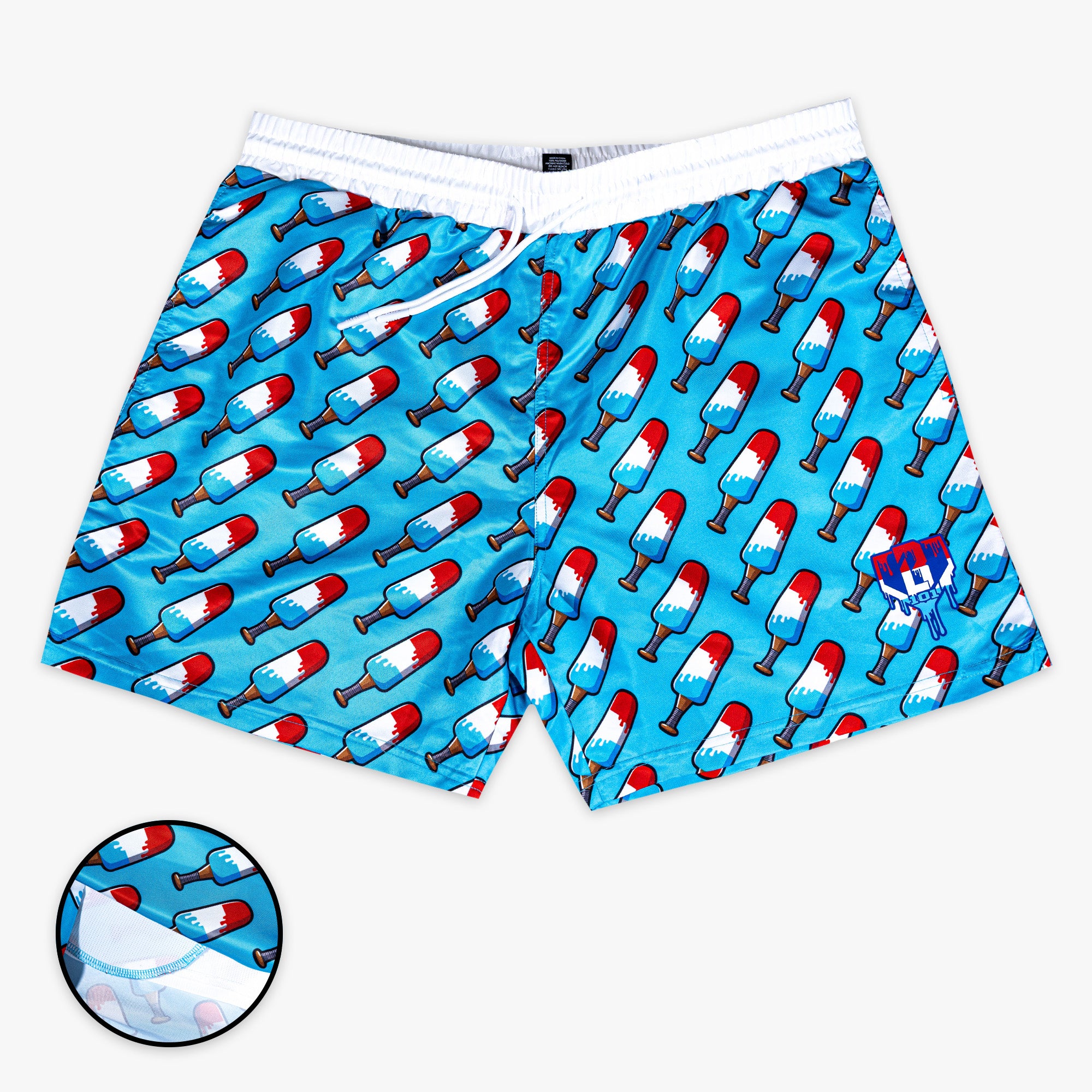 Blue shorts with red,  blue and white popsicle print on a white background