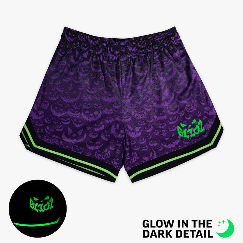Purple youth shorts with glow-in-the-dark "Jack O' Lantern Team" detail