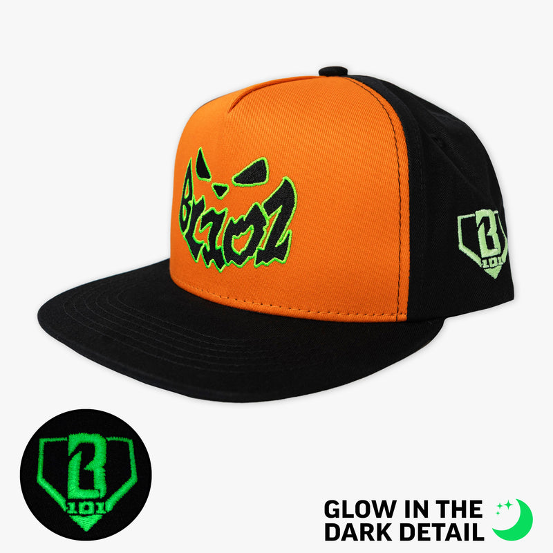 Orange hat with glow-in-the-dark "Jack O' Lantern Team" detail