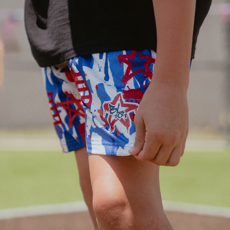 Youth model wearing graffiti Stars USA youth shorts