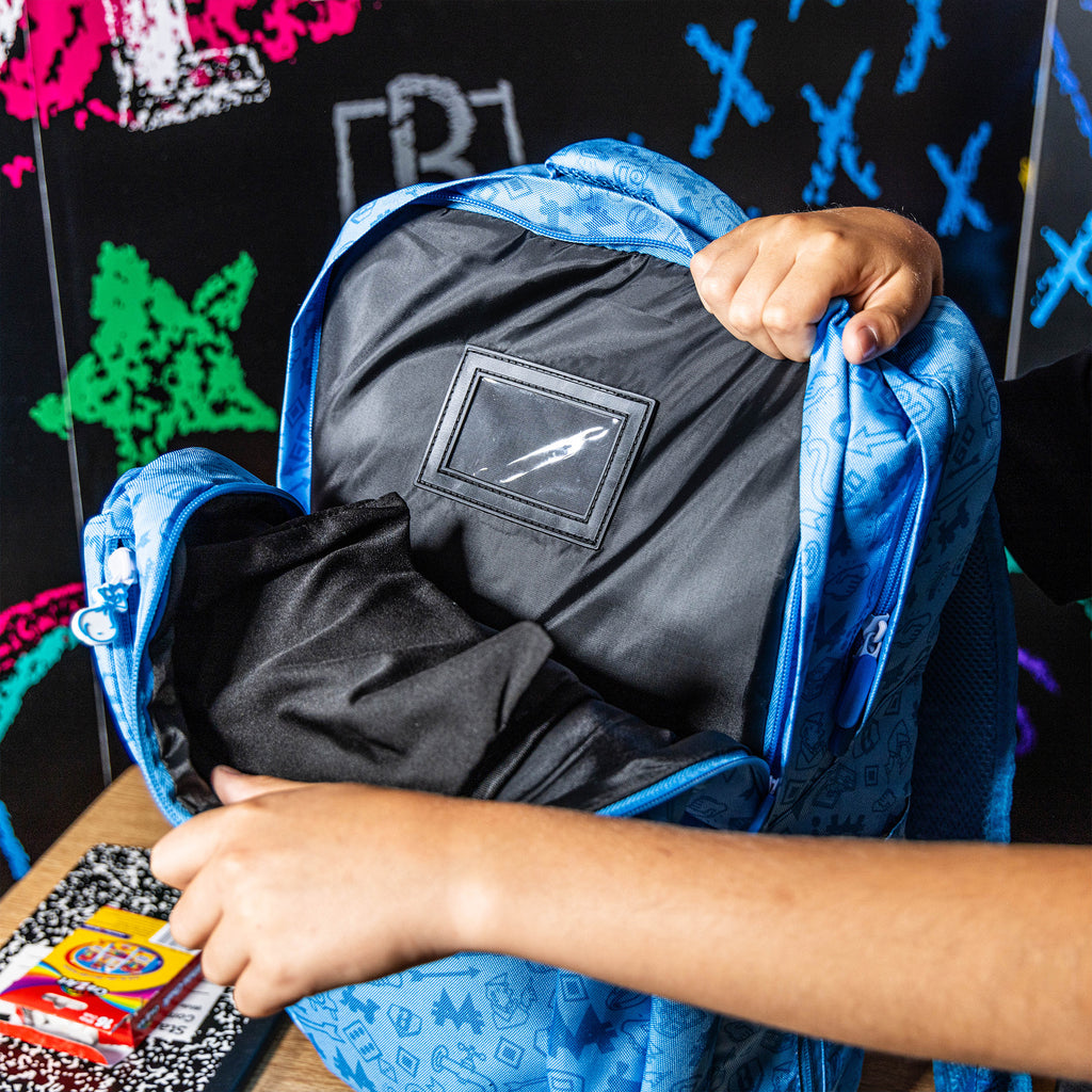 Adult model wearing backpack with “Grand Slam Collector SZN 2” design