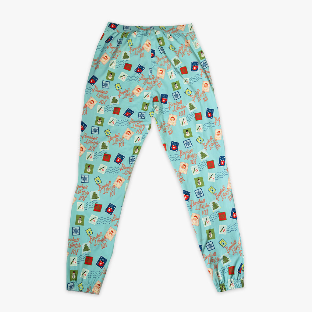Teal pajama pants with "Holiday Stamps" design — back view