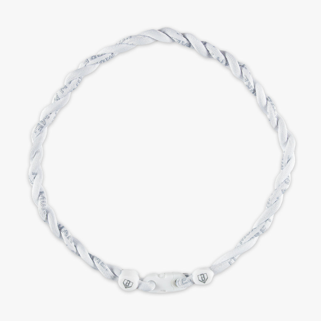 Silver necklace with marbled pattern on a white background