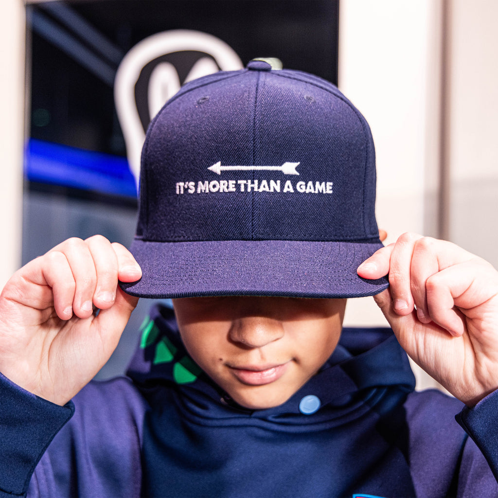 Adult model wearing hat with “Homerun Hustle” design
