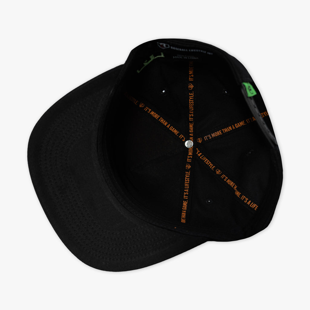 Orange hat with "Jack O' Lantern Team" design