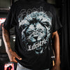 Person wearing a Black t-shirt with blue lion graphic and 'Baseball Lifestyle' text 