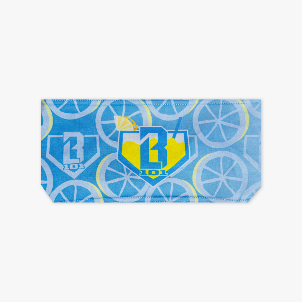 Adult model wearing blue headband with "Lemonade" design