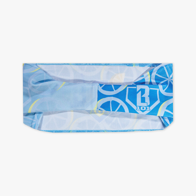Adult model wearing blue headband with "Lemonade" design