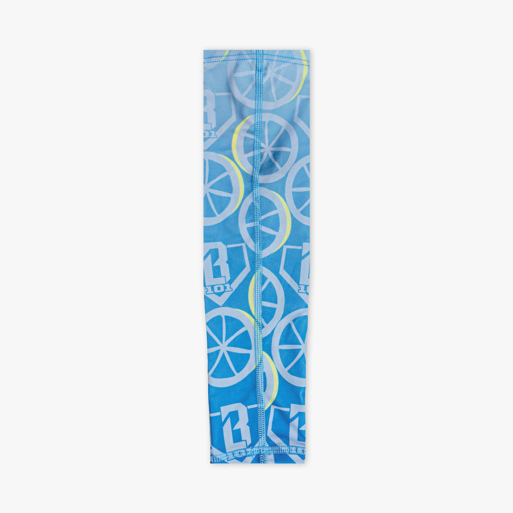 Adult model wearing blue arm sleeve with "Lemonade Splash" design