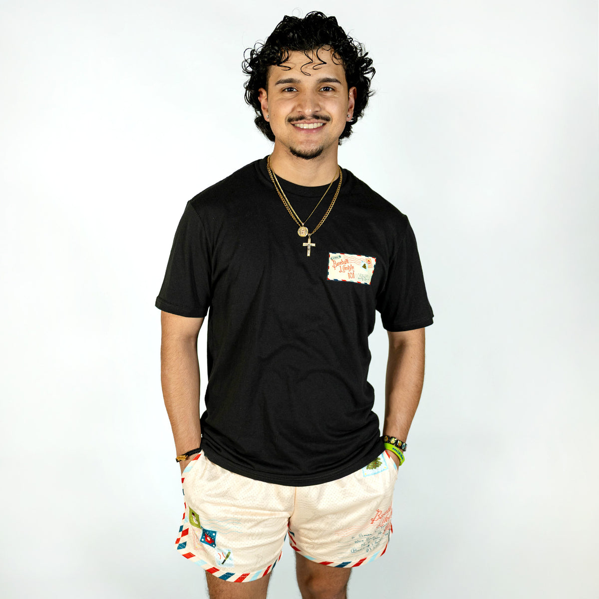 Adult model wearing black graphic tee with "Letter To Santa" design
