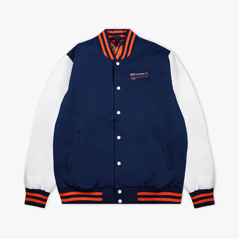 Navy and white varsity jacket with orange accents on a white background