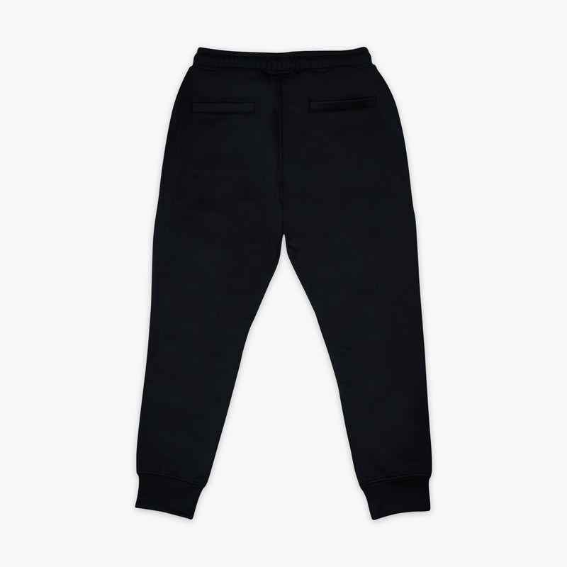 Youth joggers with “Monopoly MVP Relaxed Fit” design — back view