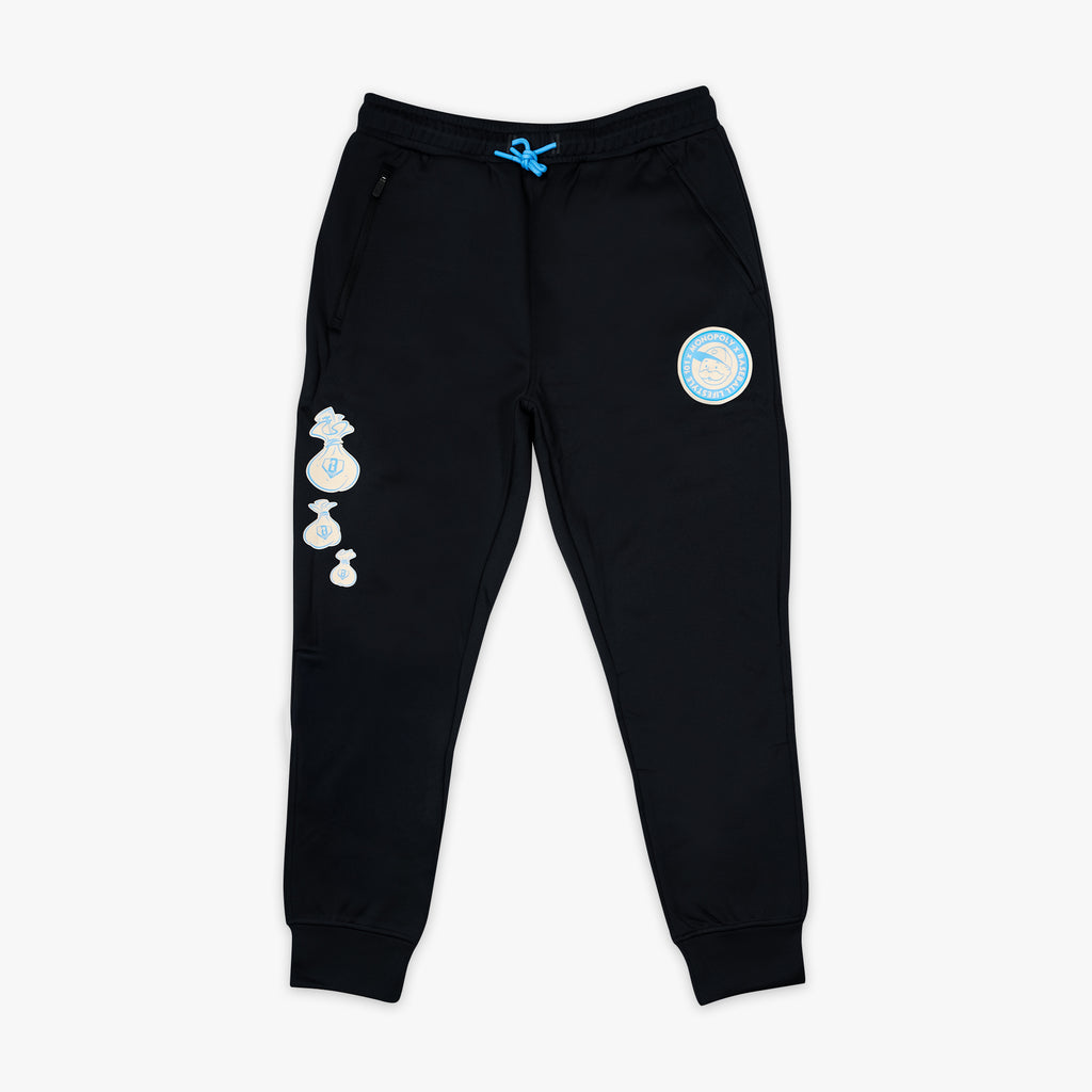 Youth joggers with “Monopoly MVP Relaxed Fit” design — front view
