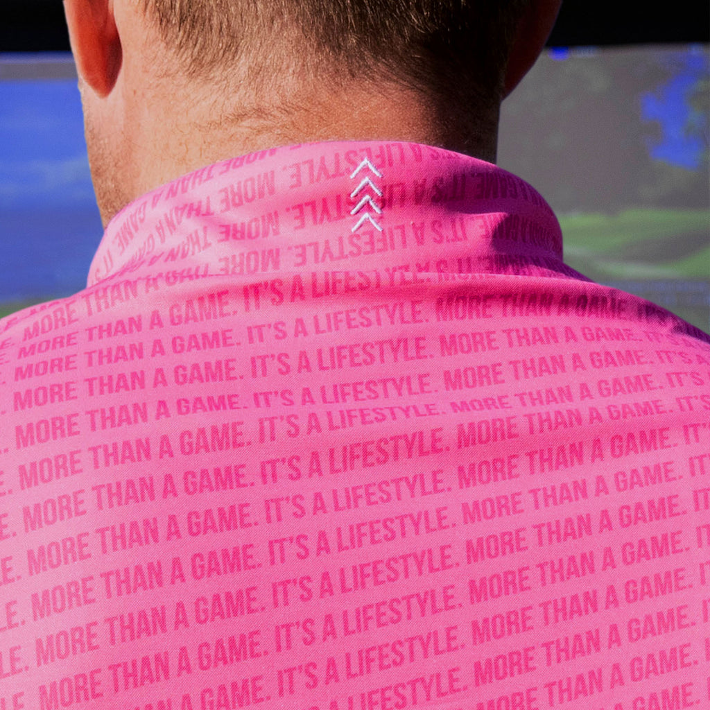 Adult model wearing pink and white More Than a Game Gradient polo