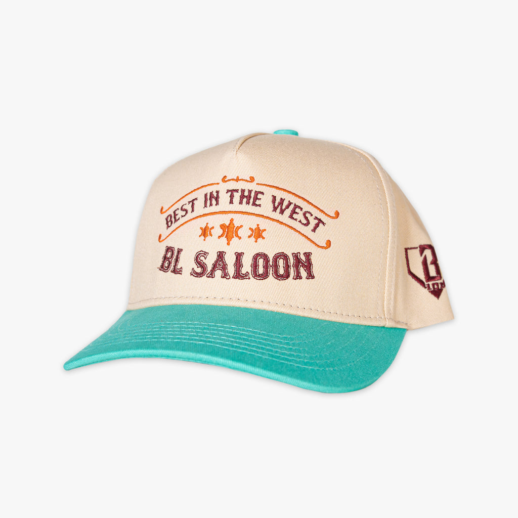 Beige and teal cap with 'Best in the West' and 'BL Saloon' text on a white background