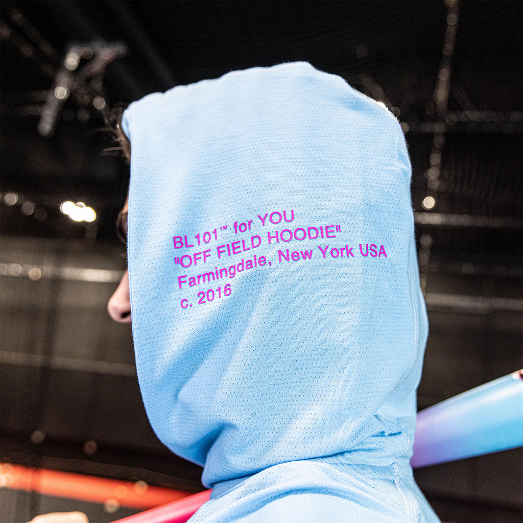 Adult model wearing blue Off-Field Cotton Candy Blue hoodie