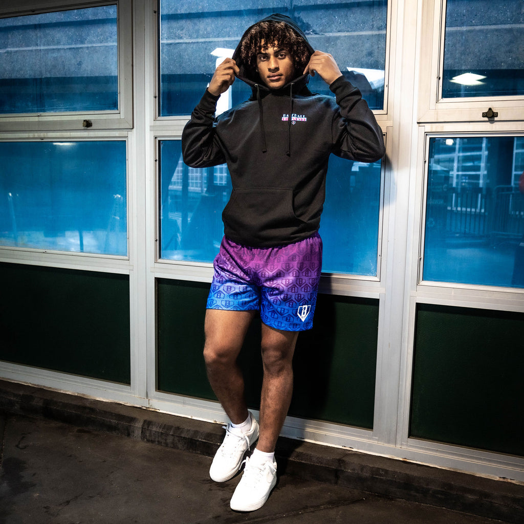 Adult model wearing gradient City Vice shorts