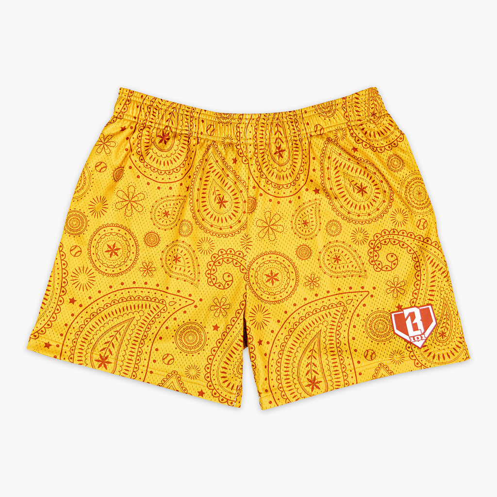Orange Paisley youth shorts — front view