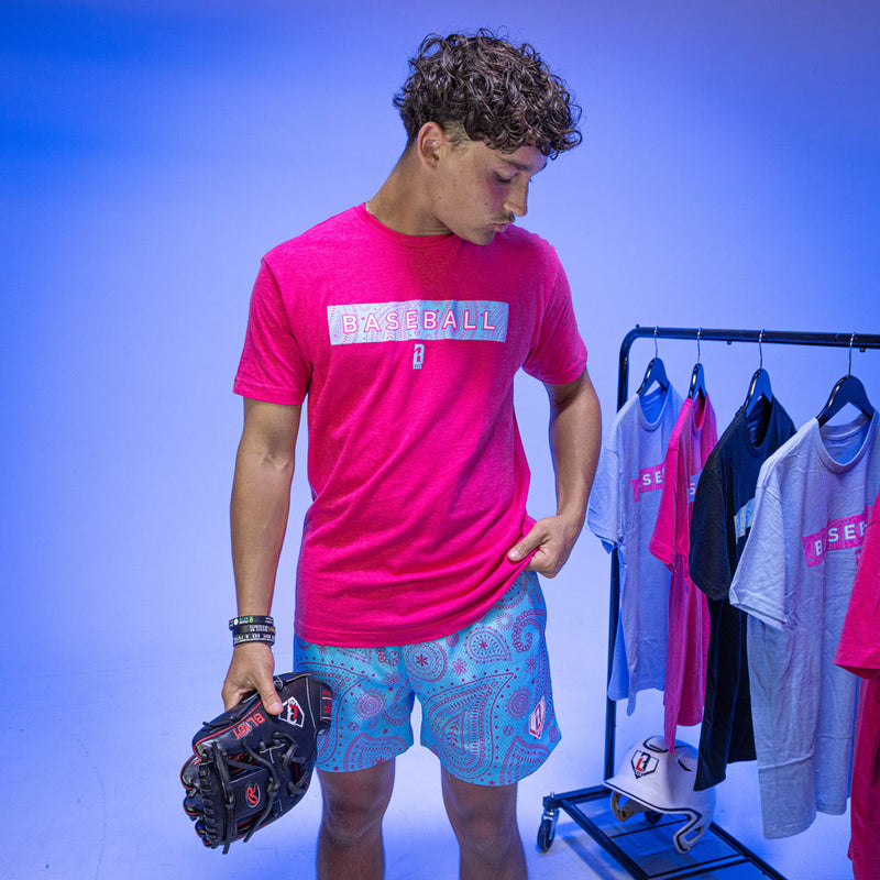Adult model wearing pink Paisley Cotton Candy Pink graphic tee