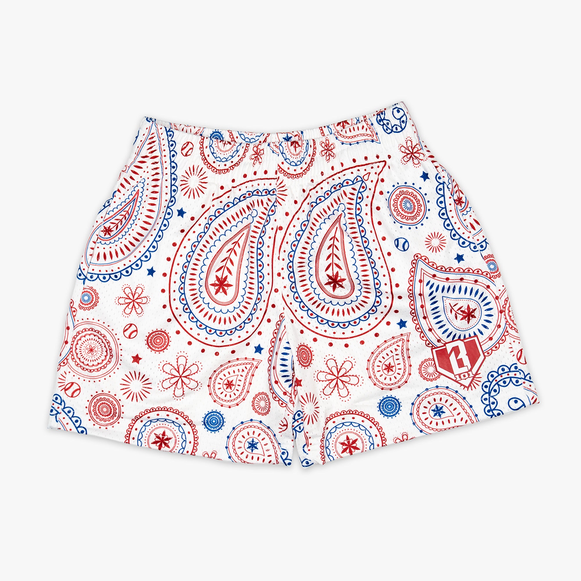Youth model wearing red Paisley Freedom youth shorts