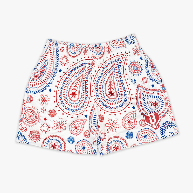 Youth model wearing red Paisley Freedom youth shorts