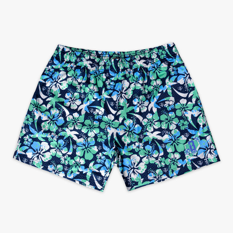 Navy blue shorts with a green, blue and white floral pattern on a white background