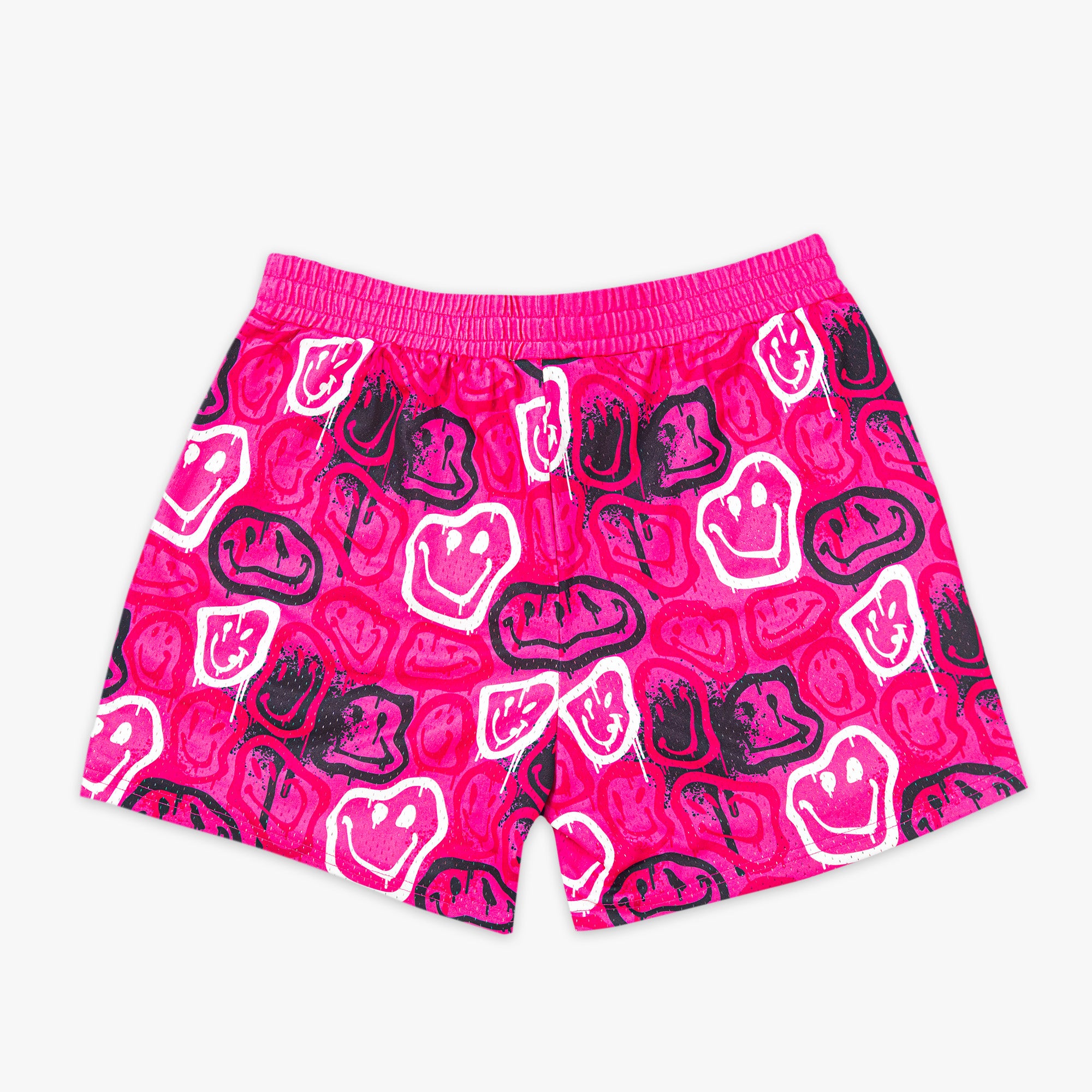 Pink shorts with black and white smiley graphics on a white background