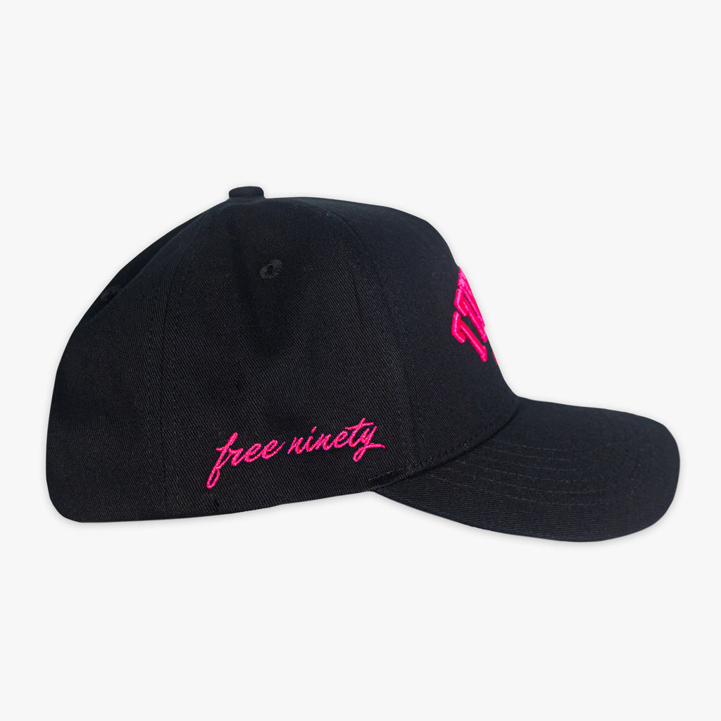 Black cap with pink 'free ninety' text on a white background