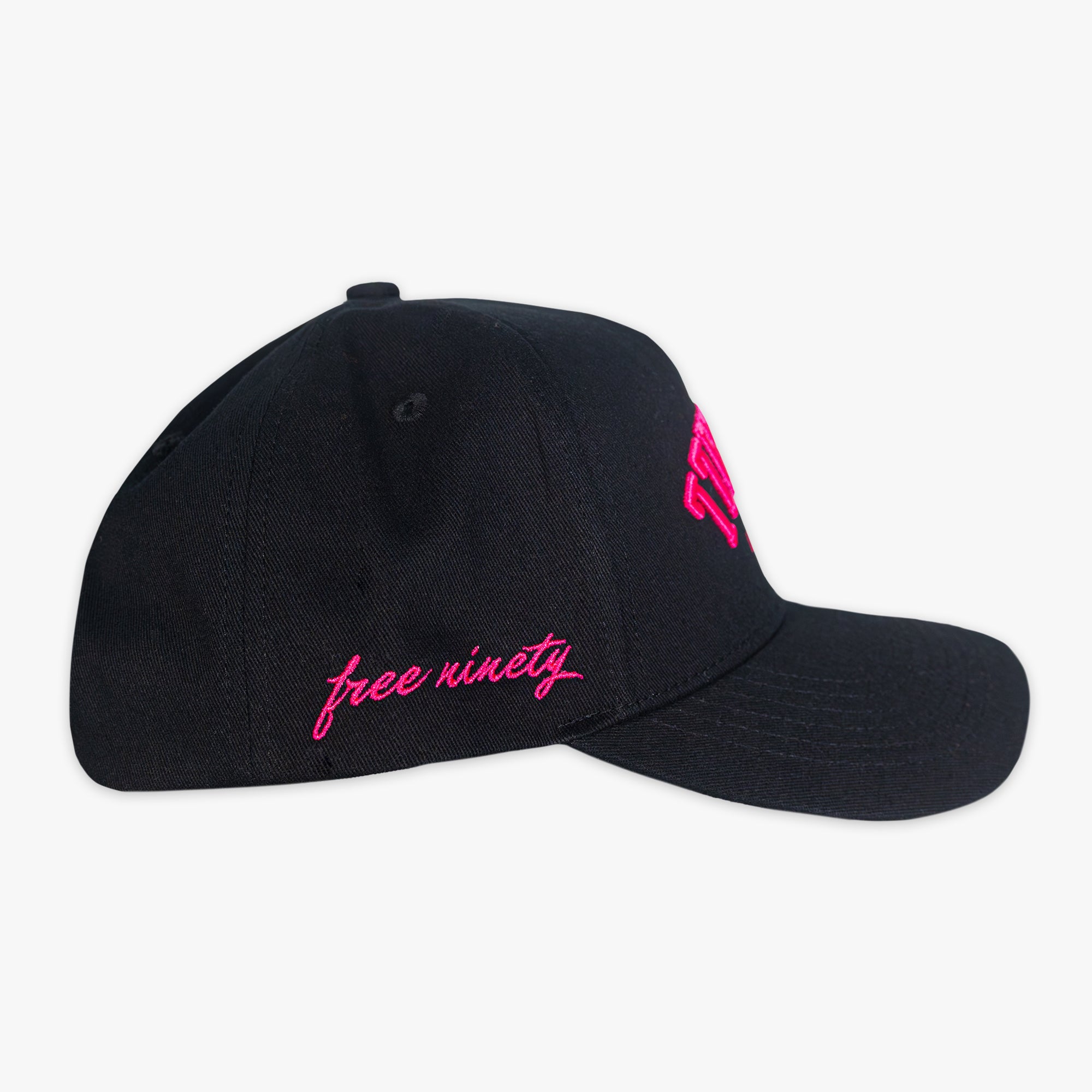 Black cap with pink 'free ninety' text on a white background