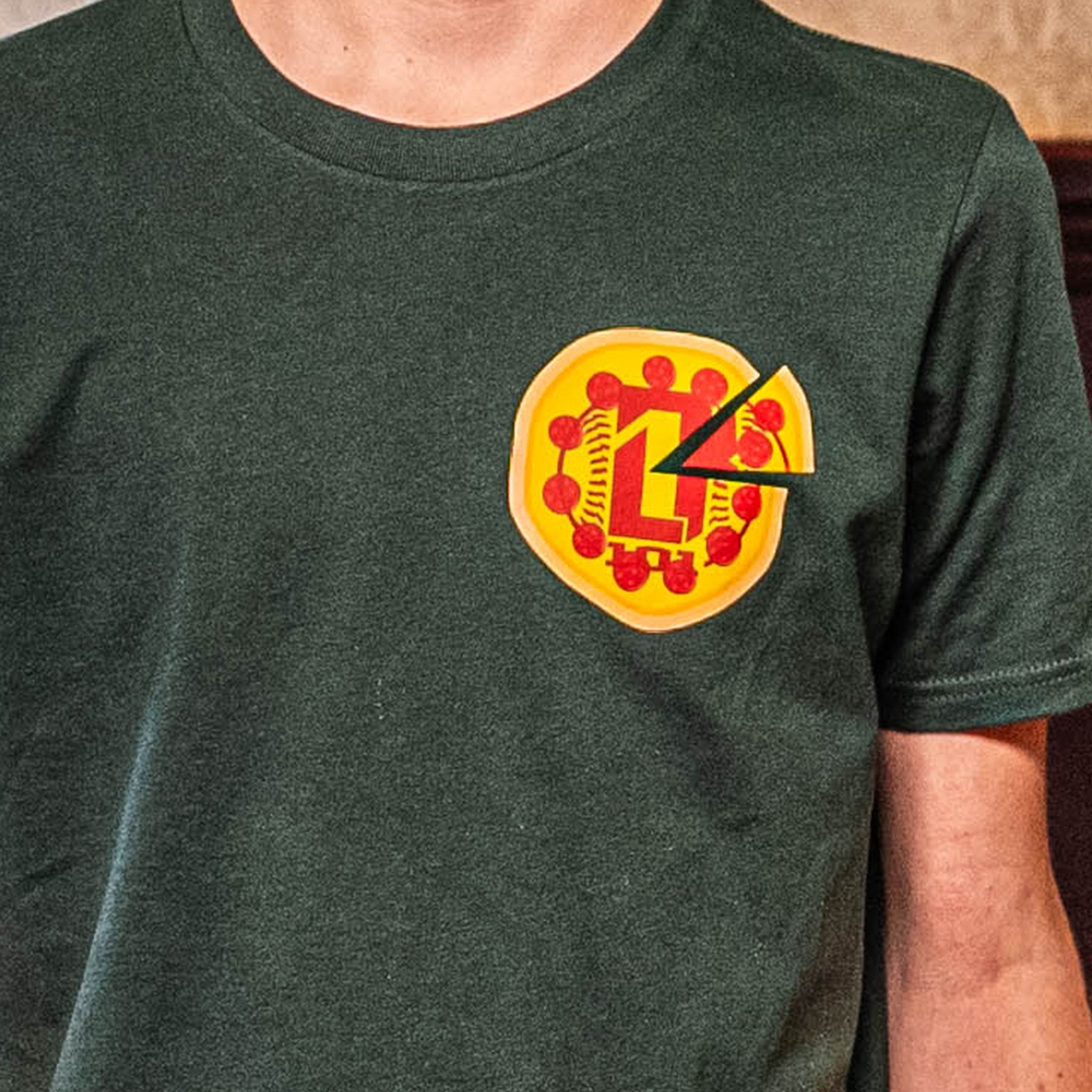 Adult model wearing graphic tee with “Pizza Delivery” design