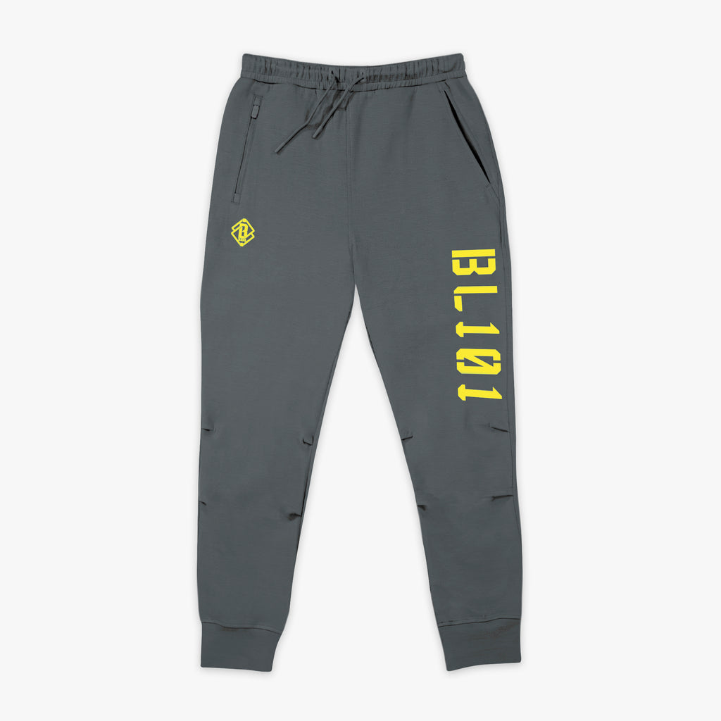 Gray sweatpants with yellow BL101 logo and text on a white background