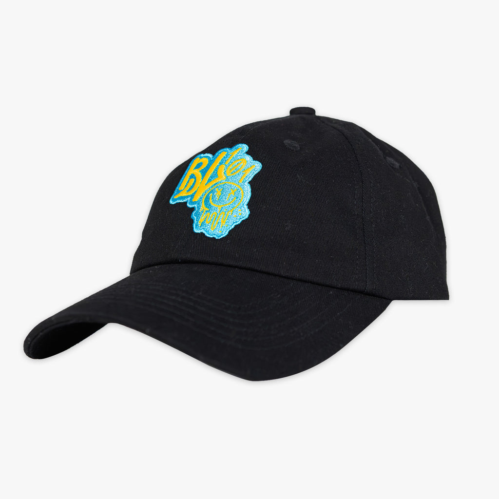 Black cap with a blue and yellow BL101 logo and smiley face on a white background