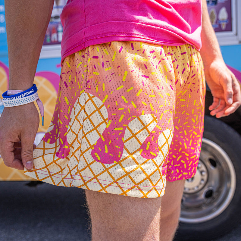 Youth model wearing pink Ice Cream Strawberry Banana youth shorts