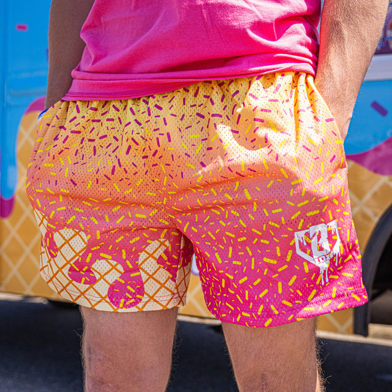 Youth model wearing pink Ice Cream Strawberry Banana youth shorts