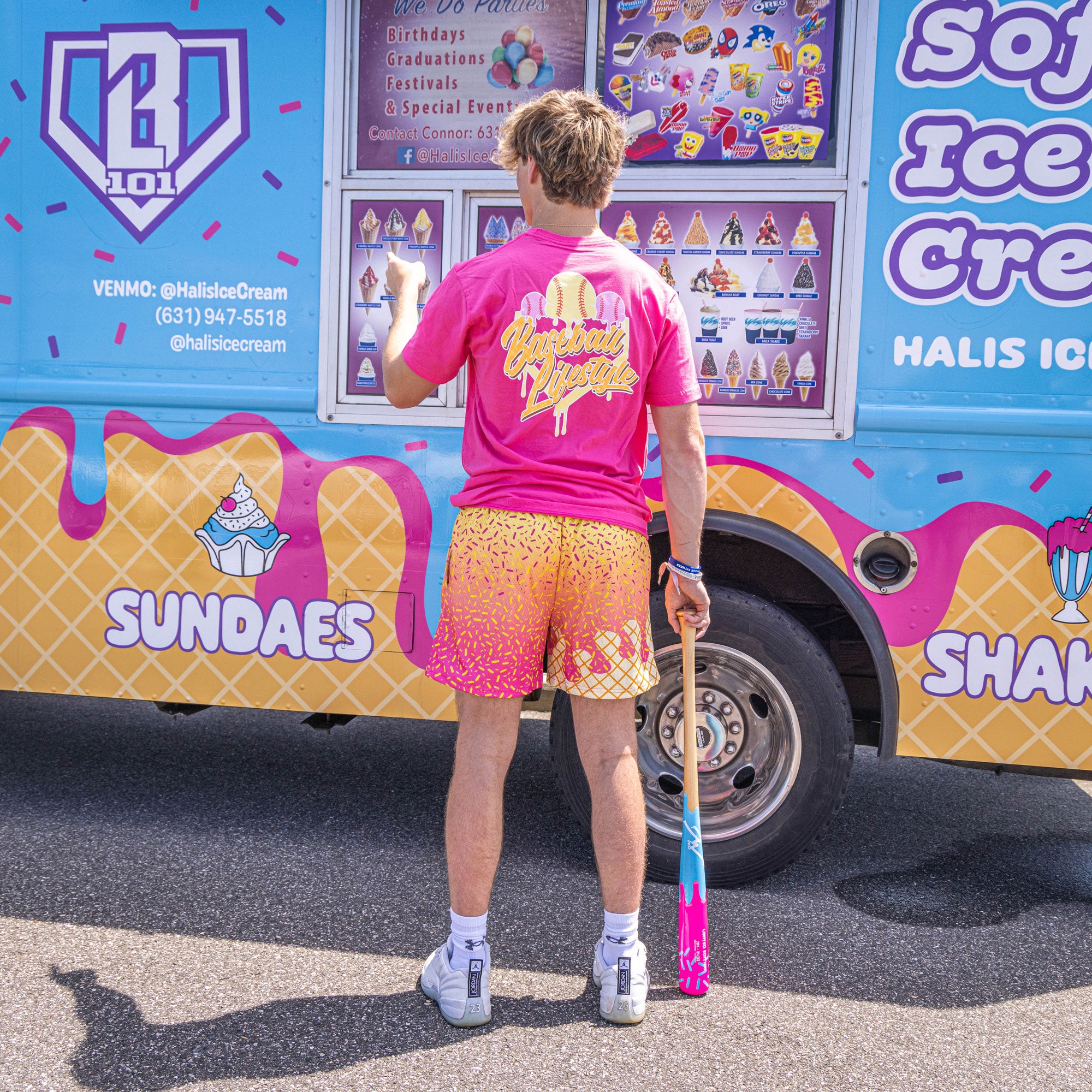 Adult model wearing pink Ice Cream Strawberry Banana graphic tee