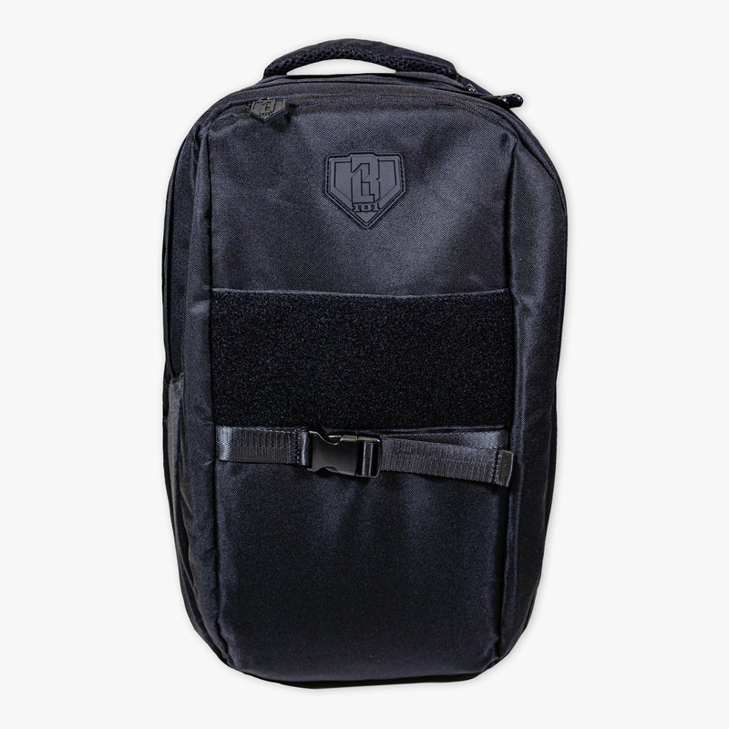 Adult model wearing black backpack with "SZN 2" design