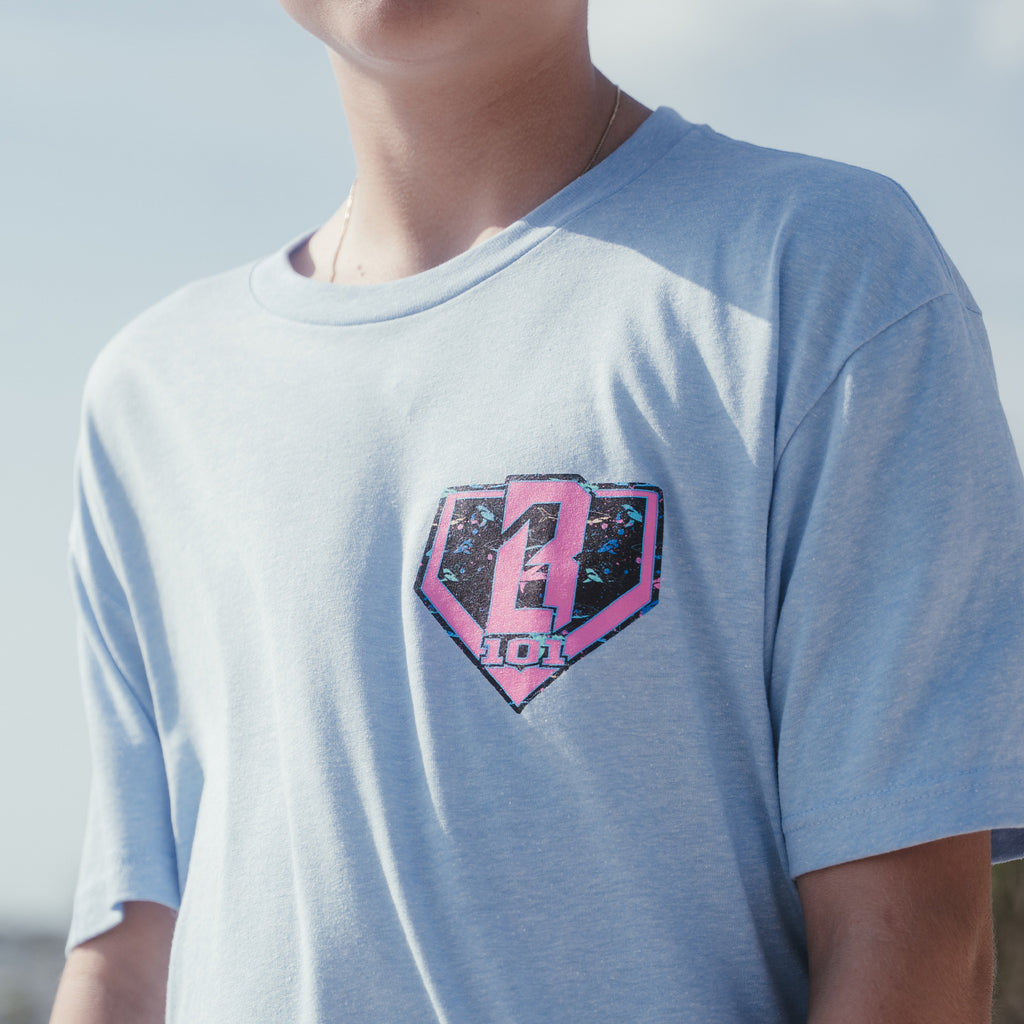 Youth model wearing blue Shark Cotton Candy Blue youth graphic tee