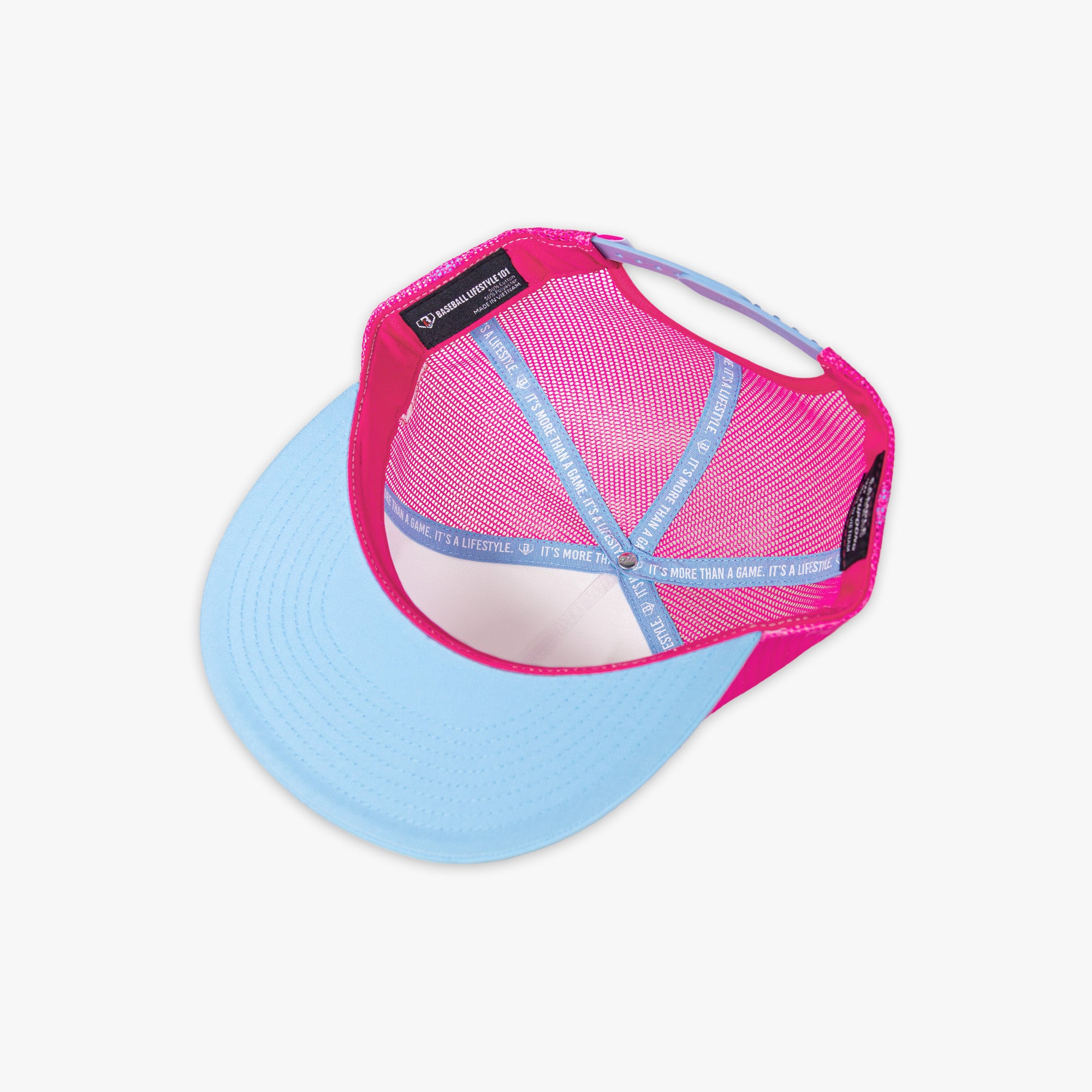 Pink and blue cap with mesh back and Baseball Lifestyle 101 tag on a white background