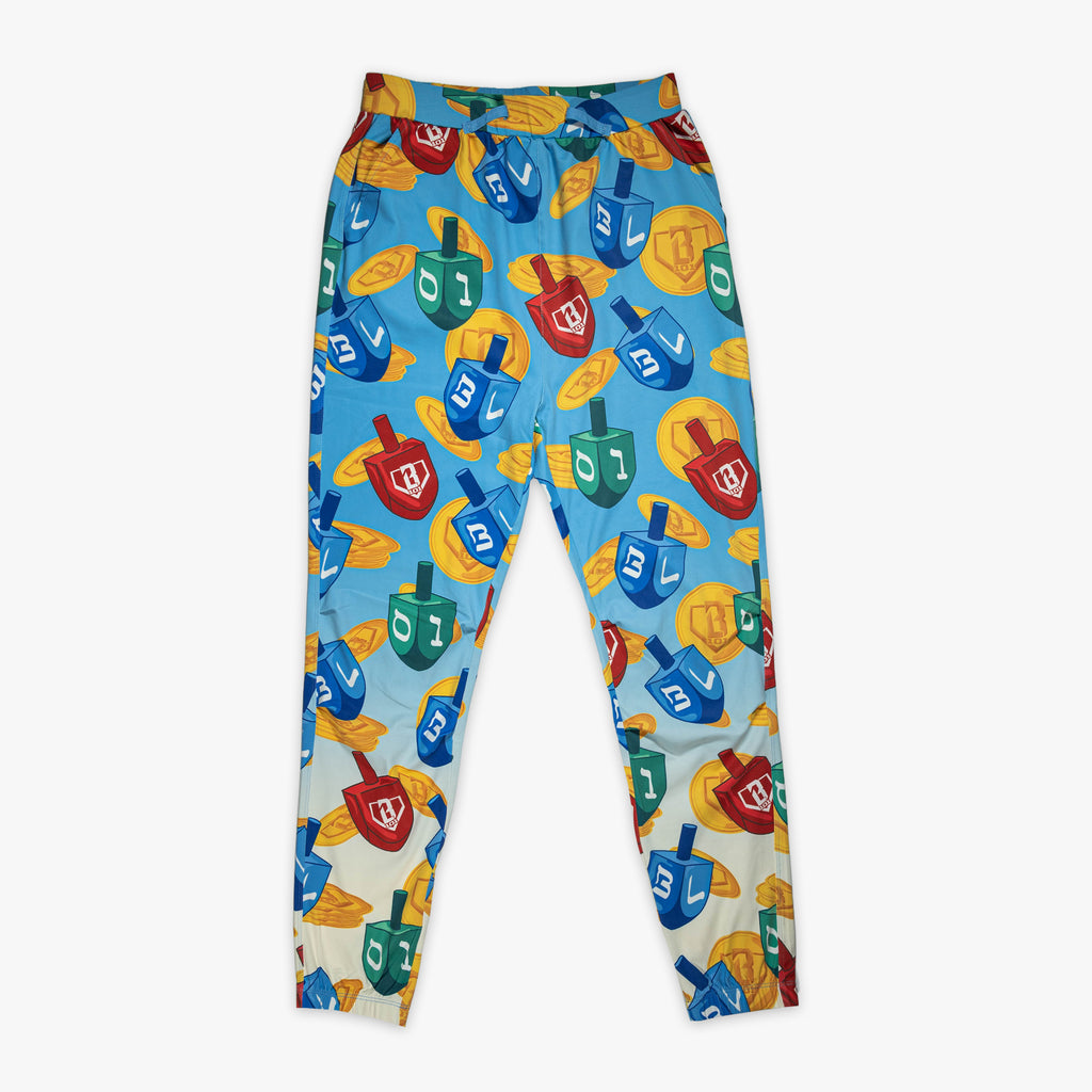 Blue pajama pants with "Spin & Swing" design — front view