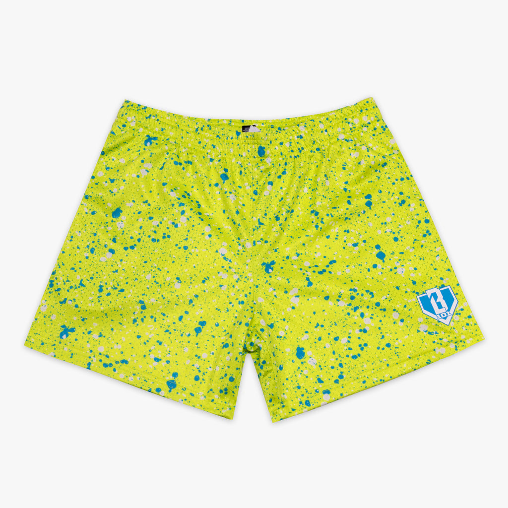 Yellow shorts with blue speckles on a white background