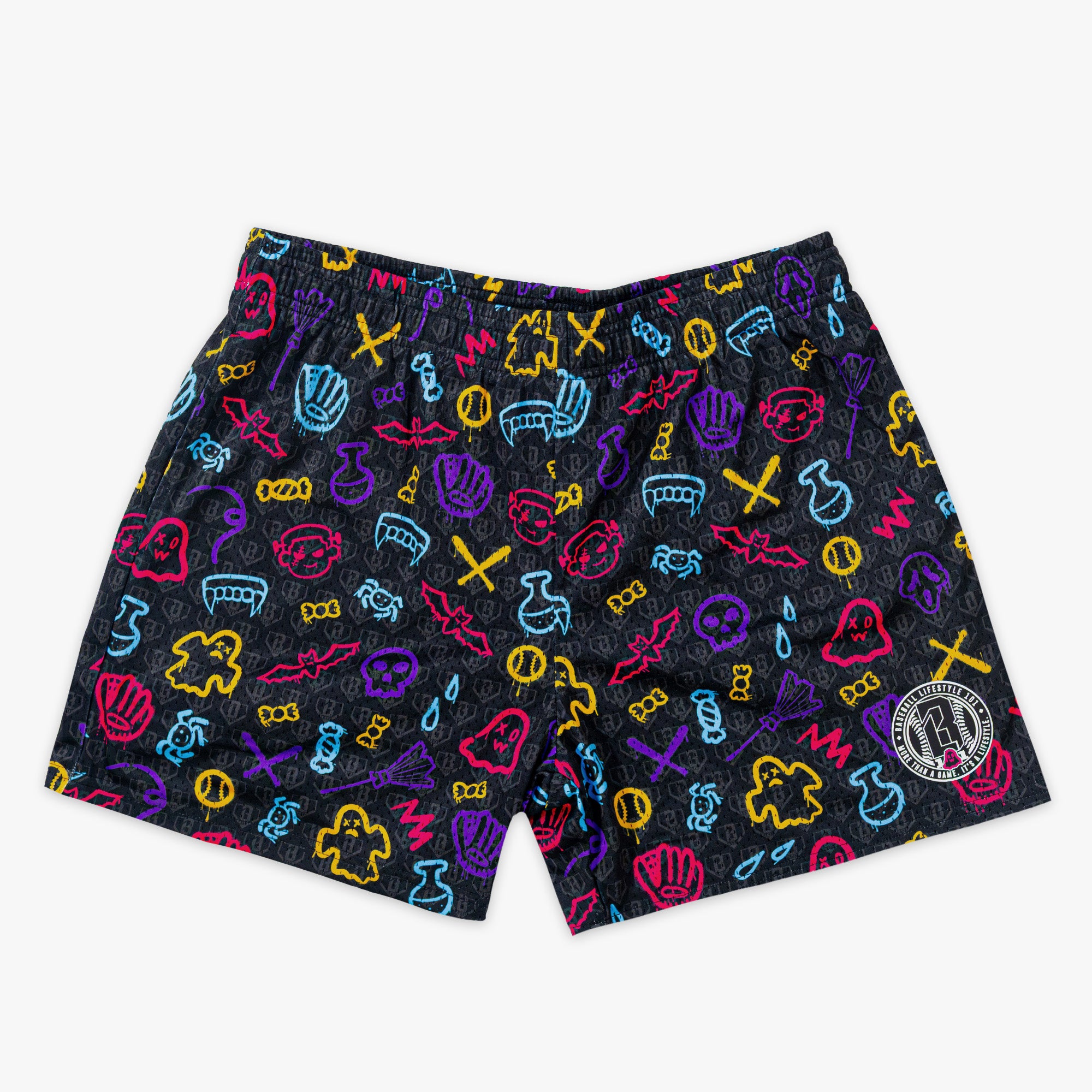 Halloween patterned shorts with ghosts, bats, spiders and baseballs on a white background