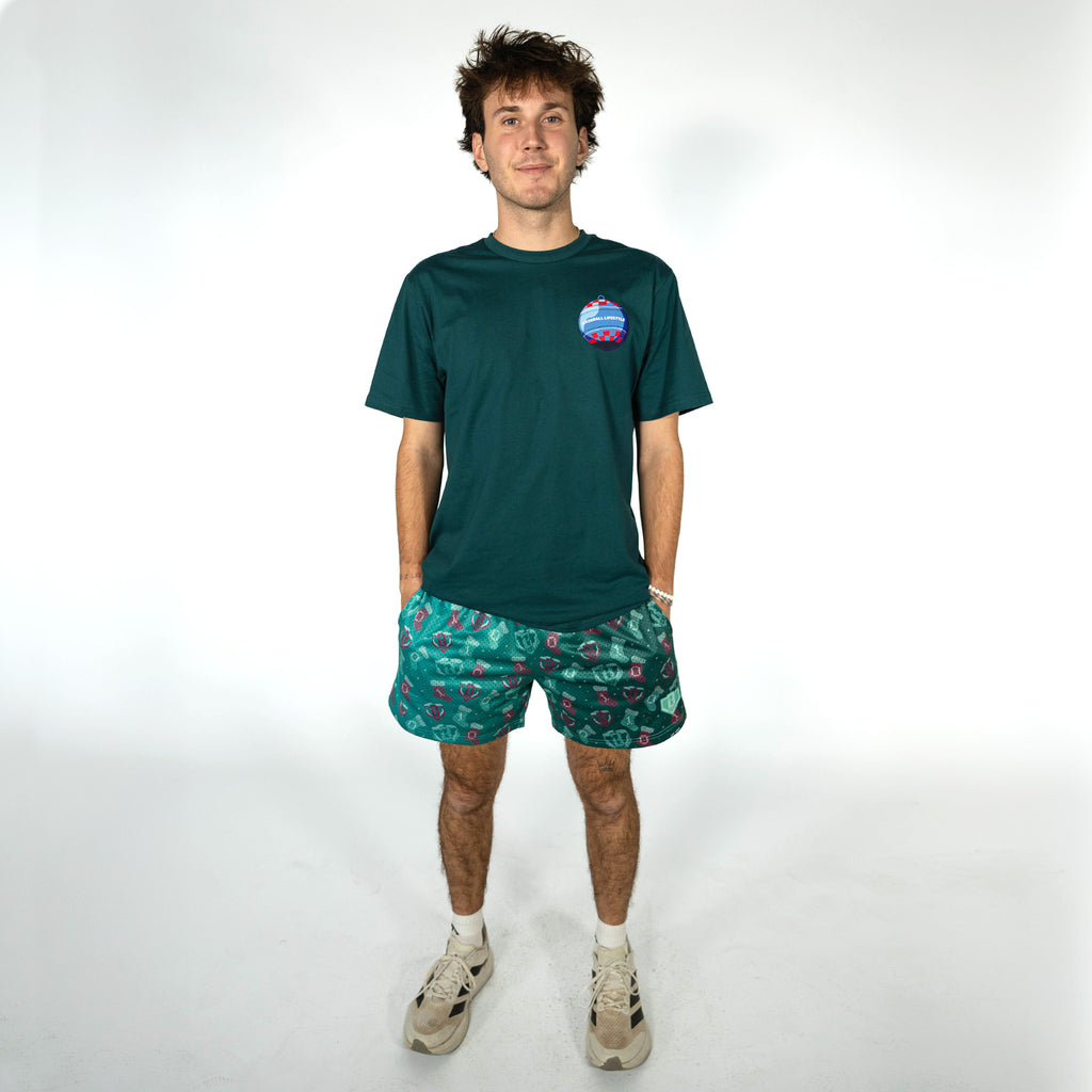 Adult model wearing green Stitched For The SZN shorts