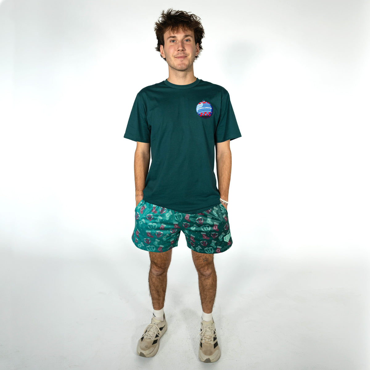 Adult model wearing green Stitched For The SZN shorts