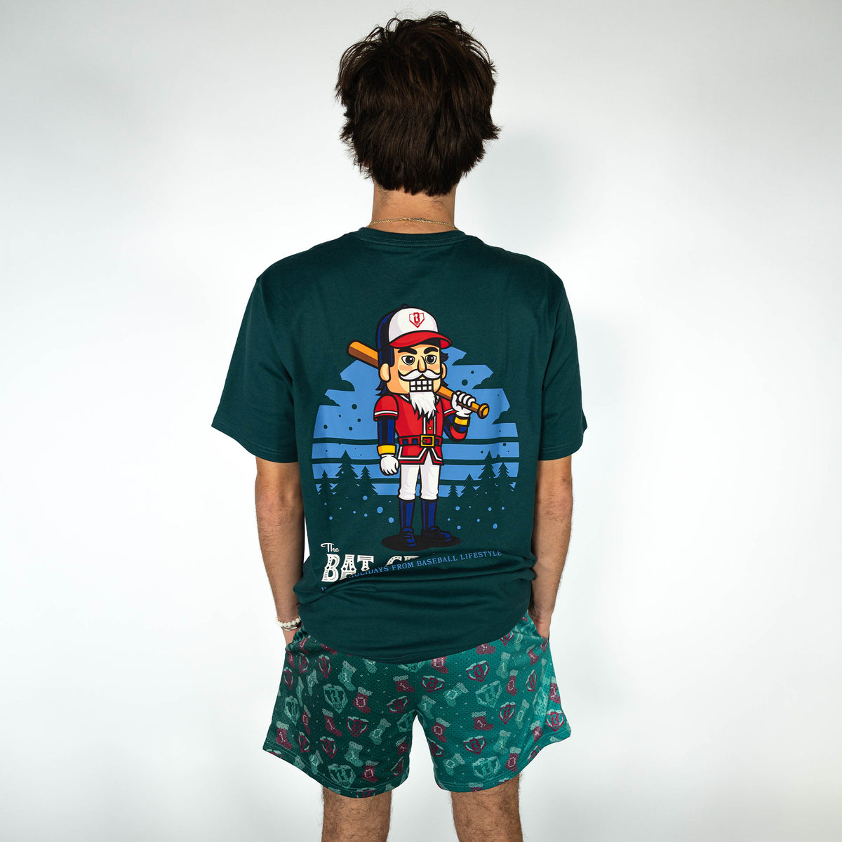 Adult model wearing green Stitched For The SZN shorts